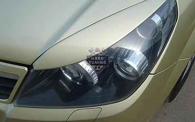 Накладки на фары Opel Astra H/GTC узкие (2005-2011)