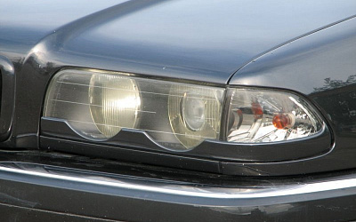 Накладки на фары нижние BMW E38