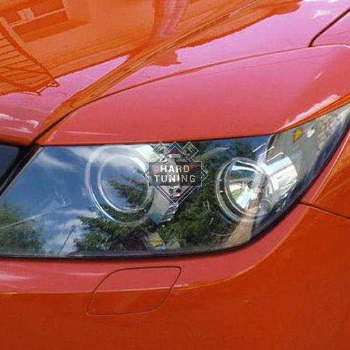 Накладки на фары широкие Opel Astra H/GTC (2005-2011)