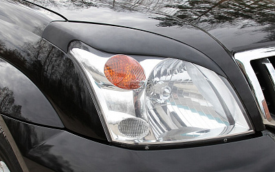 Накладки на фары фигурные Toyota Land Cruiser Prado 120