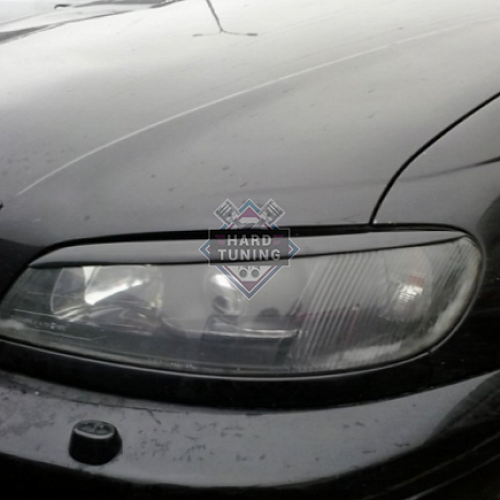 Накладки на фары Opel Omega B рестайлинг