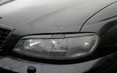 Накладки на фары Opel Omega B рестайлинг