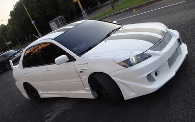 Накладки на фары Accolade Mitsubishi Lancer 9